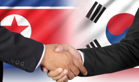 Shaking hands of South Korea and North Korea